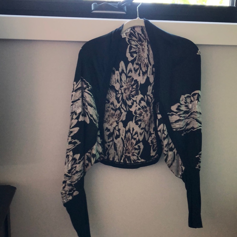 Limited edition silk shrug.